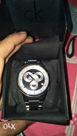 Round Black And White Chronograph Watch With Silver Link