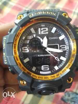Round Black And Yellow Casio G-Shock Digital Watch