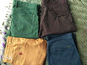 Three Blue, Green, And Brown Denim Shorts
