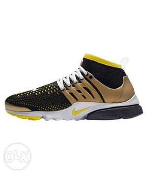 Unpaired Gold, Black, And White Nike Presto Sneaker
