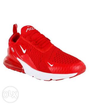 Unpaired Red And White Nike Running Shoe