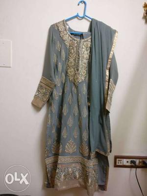 Used once, festive wear Chiffon grey and gold