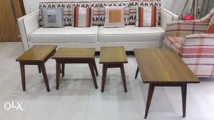 A set of 4 side tables and a centre table...all
