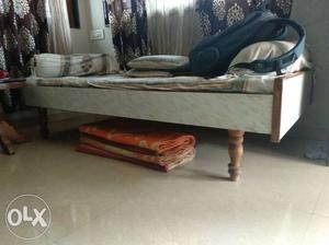A wooden bed in good condition want to sell as