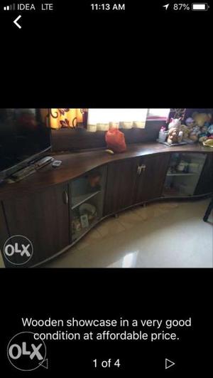 A wooden showcase in a very good condition, can