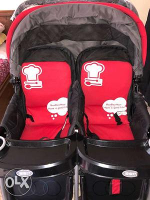 Black And Red Twin Stroller