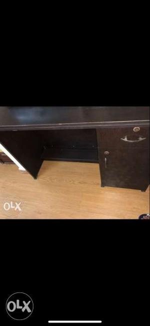 Black office desk with drawers