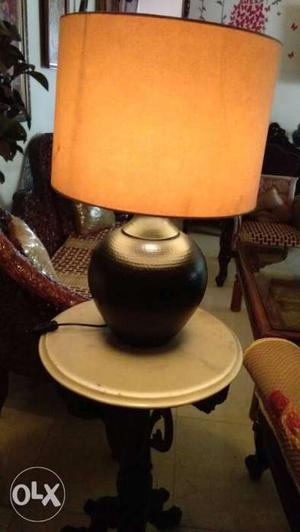 Metal base and leather top lamp in good condition