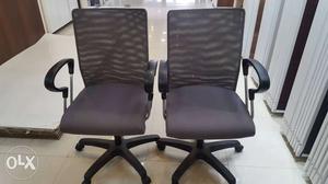 Two Black Rolling Office Chairs