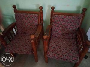 Two Brown Wooden Armchairs