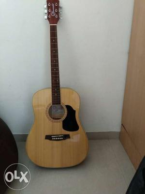 Acoustic guitar, not used even two times. new only