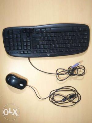 Black Logitech Corded Computer Keyboard And laser Mouse