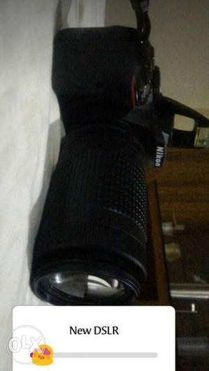 Black Nikon DSLR Camera With Text Overlay