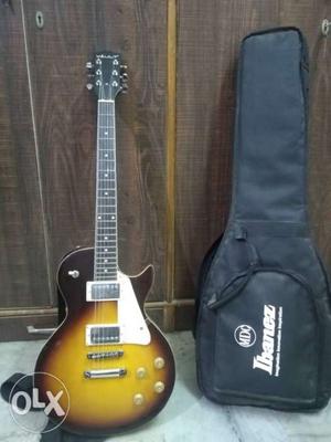 Brown Vault Les Paul-style Electric Guitar With Bag