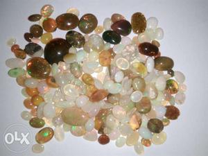 Fire opal gemstones 25/- per carat.