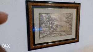 Gray Bas-relief Of Trees And Body Of Water With Frame