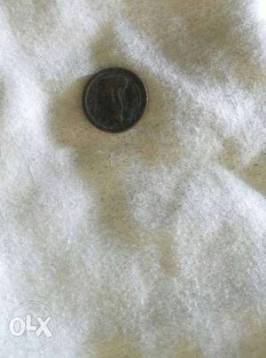 One paisa coin  with tag(rupai ka seva) and