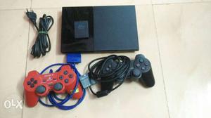Playstation 2 with 2 controllers and 32mb memory
