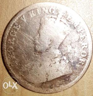 Round Silver-colored Coin