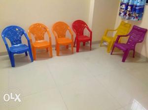 Set of 6 baby chairs & 2 hard plastic tables