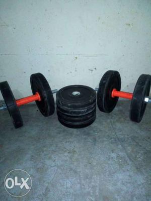 Two Orange-and-black Adjustable Dumbbells