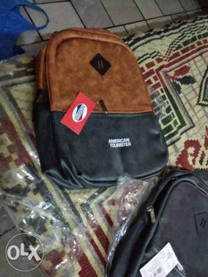 Black And Brown American Tourister Leather Backpack