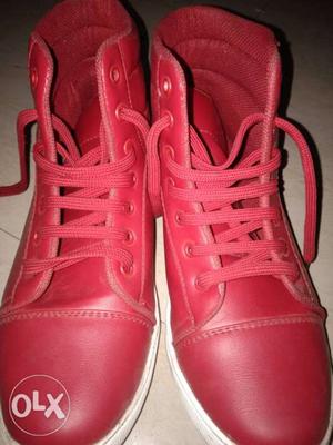 Pair Of Red Leather High-top Sneakers