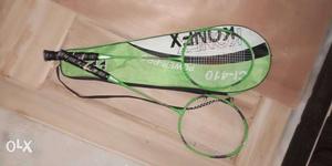 Two Black-and-green Badminton Rackets With Bag