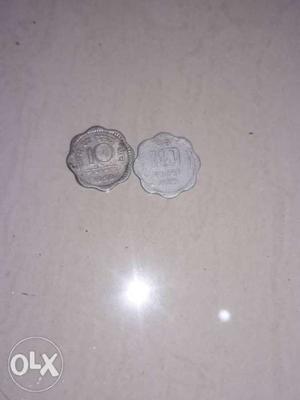Two Round Scalloped Edge Silver-colored 10 Coins