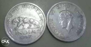Two Round Silver-colored Coins
