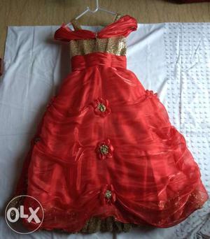 Amazing red colour floor touch gown with golden