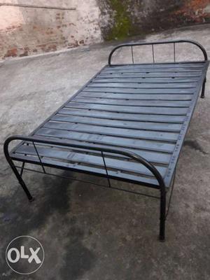 Black Metal Bed Frame With White Mattress