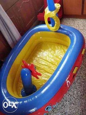 Blue, Yellow, And Red Boat Inflatable Pool