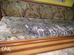Brown Wooden Framed Brown And Green Floral Padded Sofa