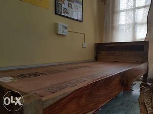One year old wooden single bed