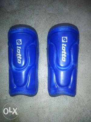 Pair Of Blue Lotto Shin Guards