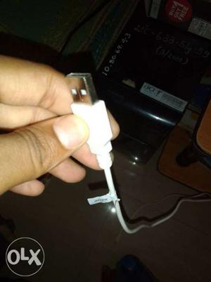 Person Holding White USB Connector