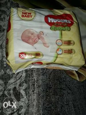 Yellow And White Huggies Diaper Pack of 2 at 300 rs