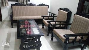 5 seater new wooden sofa with centre table.