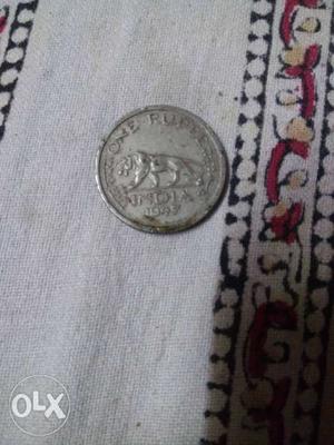 A one rupee coin from the year of independence