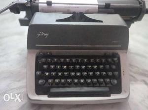 Black And Gray Godrej Typewriter