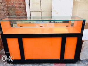 Black And Orange Wooden display counter