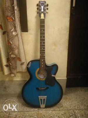 Blue And Black Acoustic Guitar