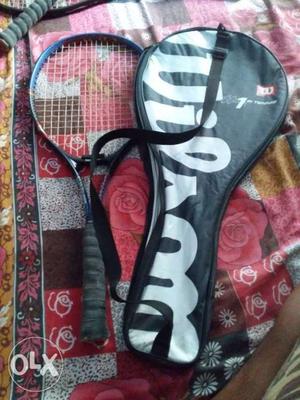 Blue And Black Wilson Tennis Racket And Bag