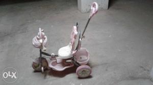 Child's White And Pink Push-and-ride Trike