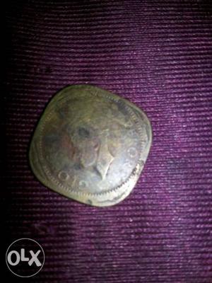 Copper-colored George King Emperor Coin
