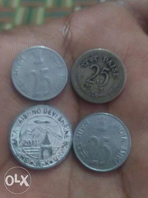 Four Round Silver-colored Indian Paise Coins
