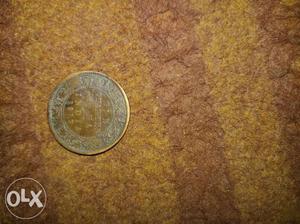 Golden coin old.  raja in indian 25 pese ru