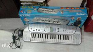 Gray And Black Electronic Keyboard With Box