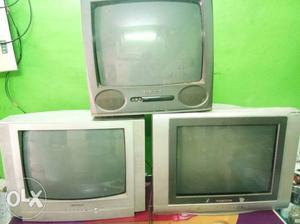 Gray CRT TV; White Wooden TV Hutch